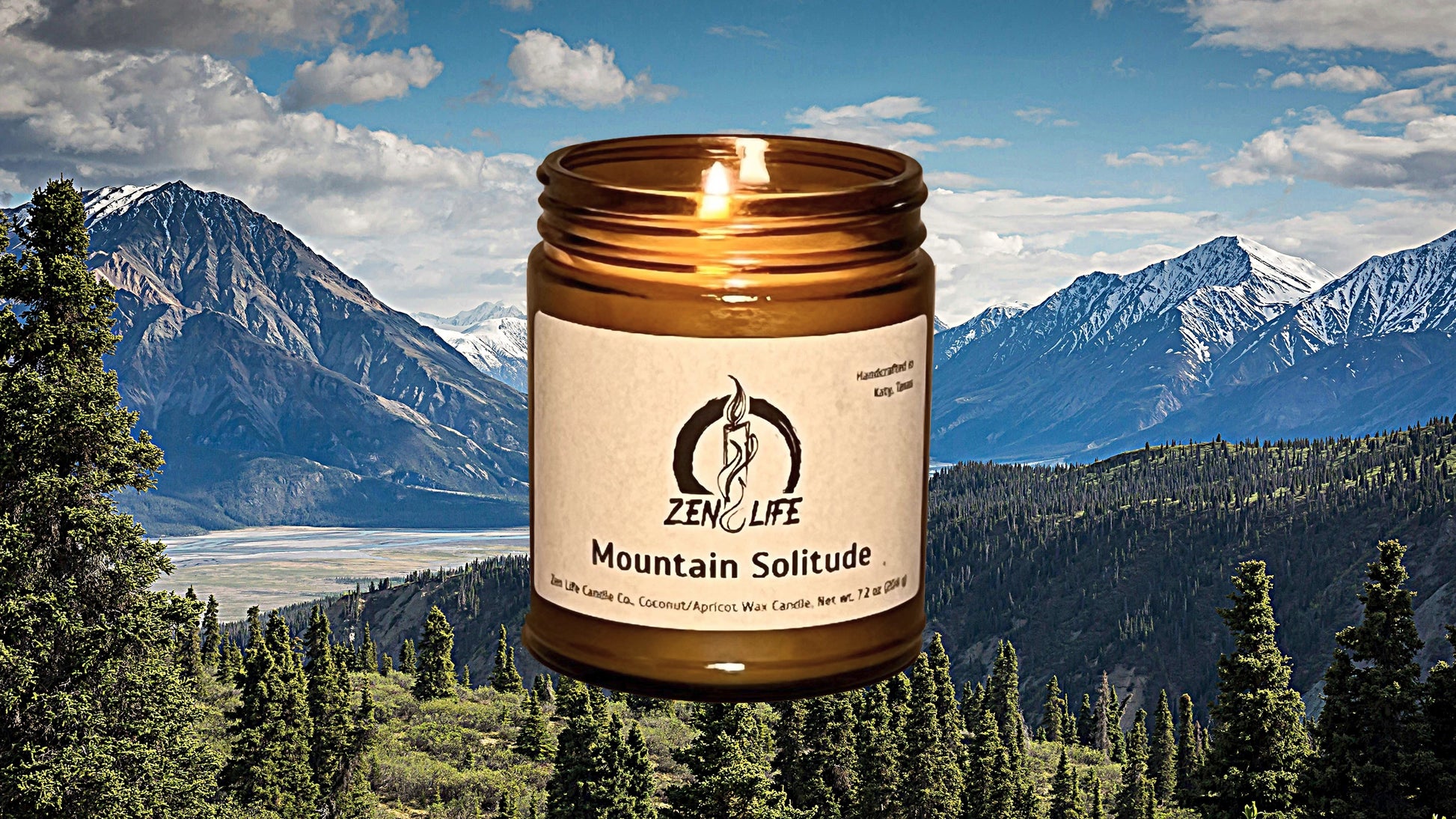 Zen Life's Mountain Solitude candle in front of a mountain landscape.