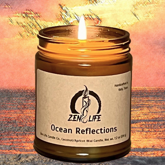 The Ocean Reflections candle over an oil pastel ocean sunset.